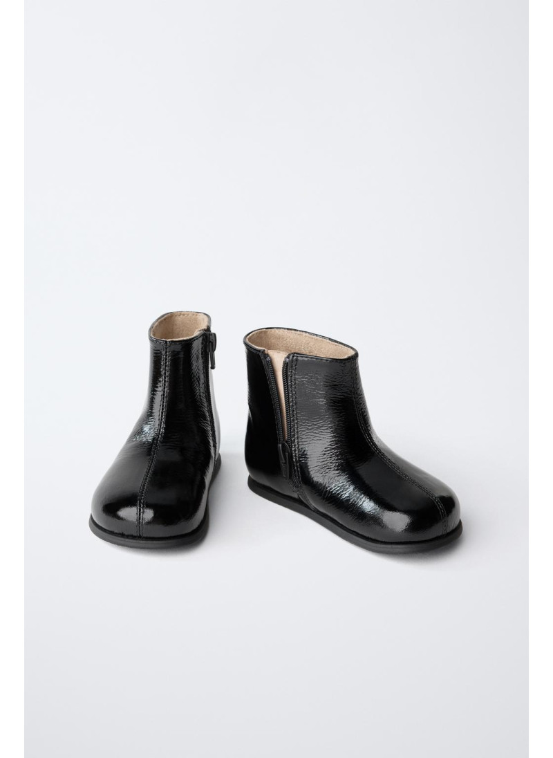 Кожаные сапоги с стежкой в клетку Кожаные сапоги с стежкой в клетку