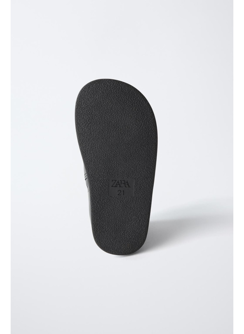 Кожаные сапоги с стежкой в клетку Кожаные сапоги с стежкой в клетку