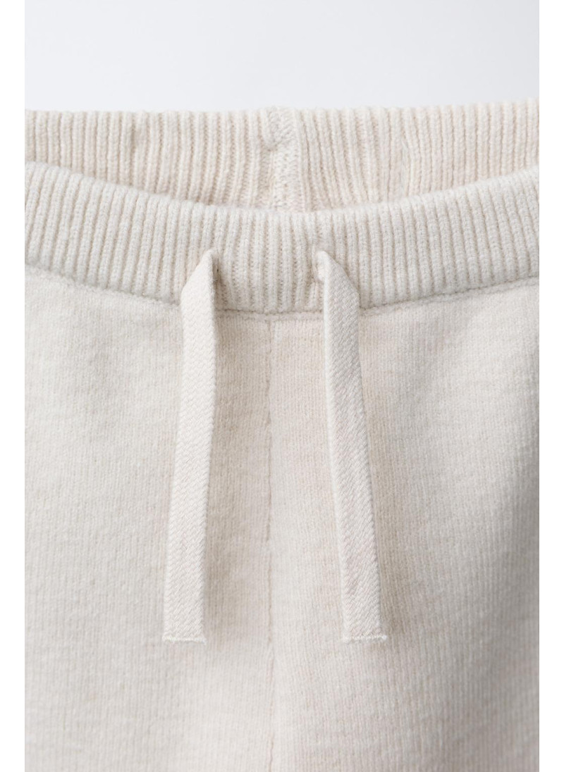 ТРИКОТАЖНЫЕ БРЮКИ-ДЖОГГЕРЫ ТРИКОТАЖНЫЕ БРЮКИ-ДЖОГГЕРЫ