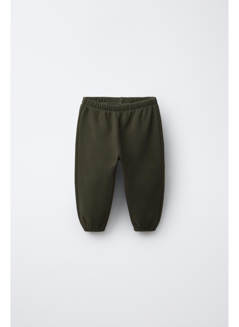 БРЮКИ-ДЖОГГЕРЫ С ЭТИКЕТКОЙ