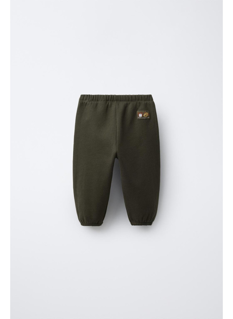 БРЮКИ-ДЖОГГЕРЫ С ЭТИКЕТКОЙ БРЮКИ-ДЖОГГЕРЫ С ЭТИКЕТКОЙ