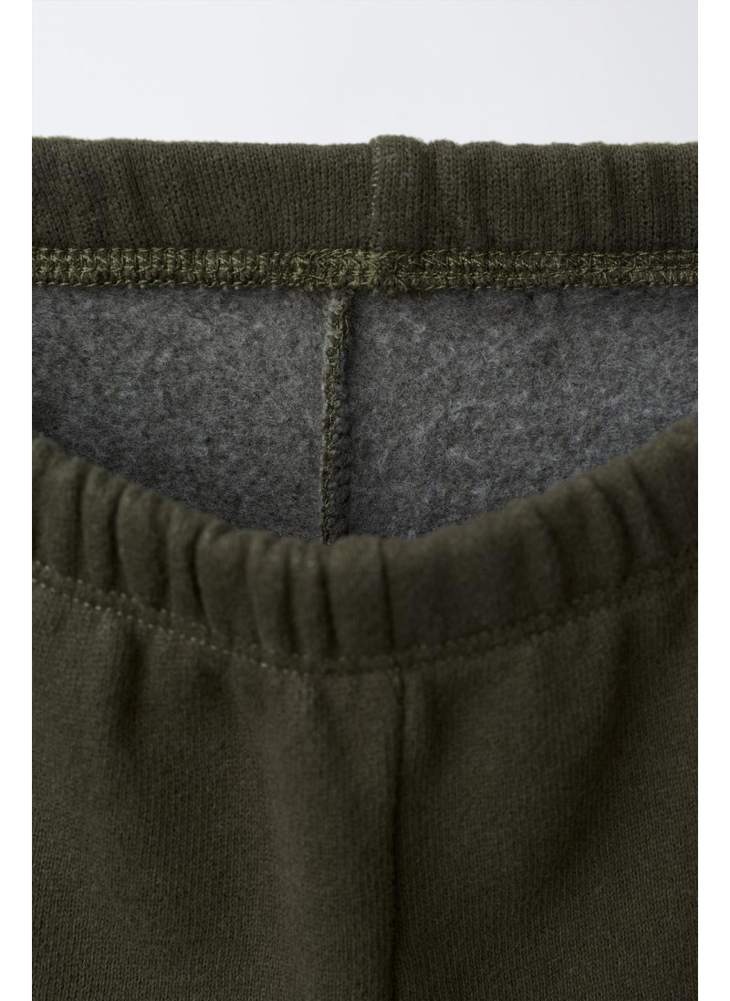 БРЮКИ-ДЖОГГЕРЫ С ЭТИКЕТКОЙ БРЮКИ-ДЖОГГЕРЫ С ЭТИКЕТКОЙ