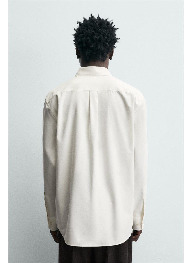 РУБАШКА КЛАССИЧЕСКОГО КРОЯ ИЗ РЕЛЬЕФНОЙ ТКАНИ ЛИМИТИРОВАННАЯ СЕРИЯ РУБАШКА КЛАССИЧЕСКОГО КРОЯ ИЗ РЕЛЬЕФНОЙ ТКАНИ ЛИМИТИРОВАННАЯ СЕРИЯ