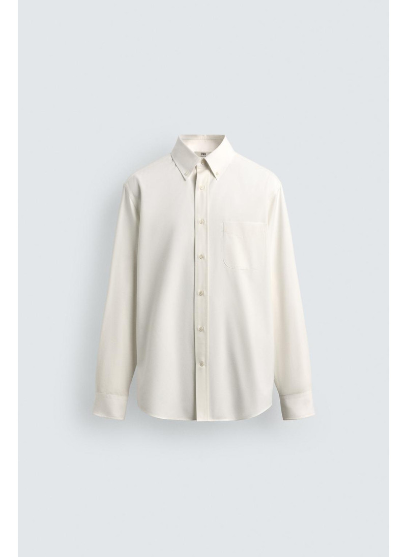 РУБАШКА КЛАССИЧЕСКОГО КРОЯ ИЗ РЕЛЬЕФНОЙ ТКАНИ ЛИМИТИРОВАННАЯ СЕРИЯ РУБАШКА КЛАССИЧЕСКОГО КРОЯ ИЗ РЕЛЬЕФНОЙ ТКАНИ ЛИМИТИРОВАННАЯ СЕРИЯ