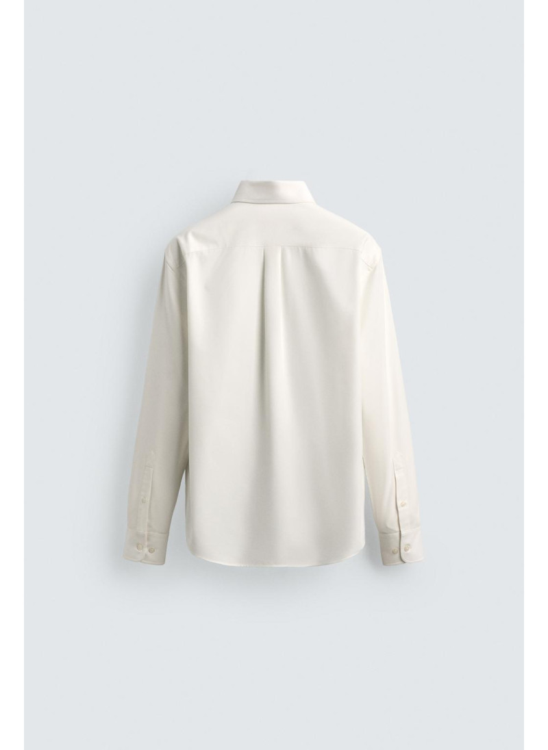 РУБАШКА КЛАССИЧЕСКОГО КРОЯ ИЗ РЕЛЬЕФНОЙ ТКАНИ ЛИМИТИРОВАННАЯ СЕРИЯ РУБАШКА КЛАССИЧЕСКОГО КРОЯ ИЗ РЕЛЬЕФНОЙ ТКАНИ ЛИМИТИРОВАННАЯ СЕРИЯ