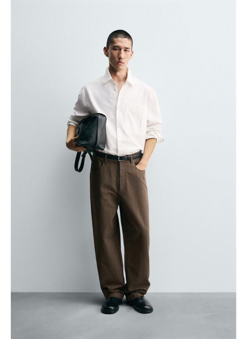 Брюки в полоску с шариковой...