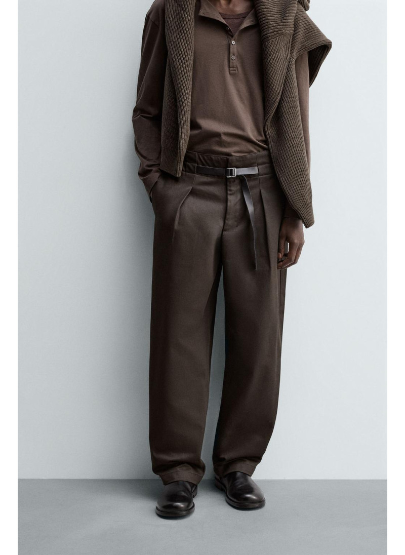 Брюки с защипами и поясом Брюки с защипами и поясом