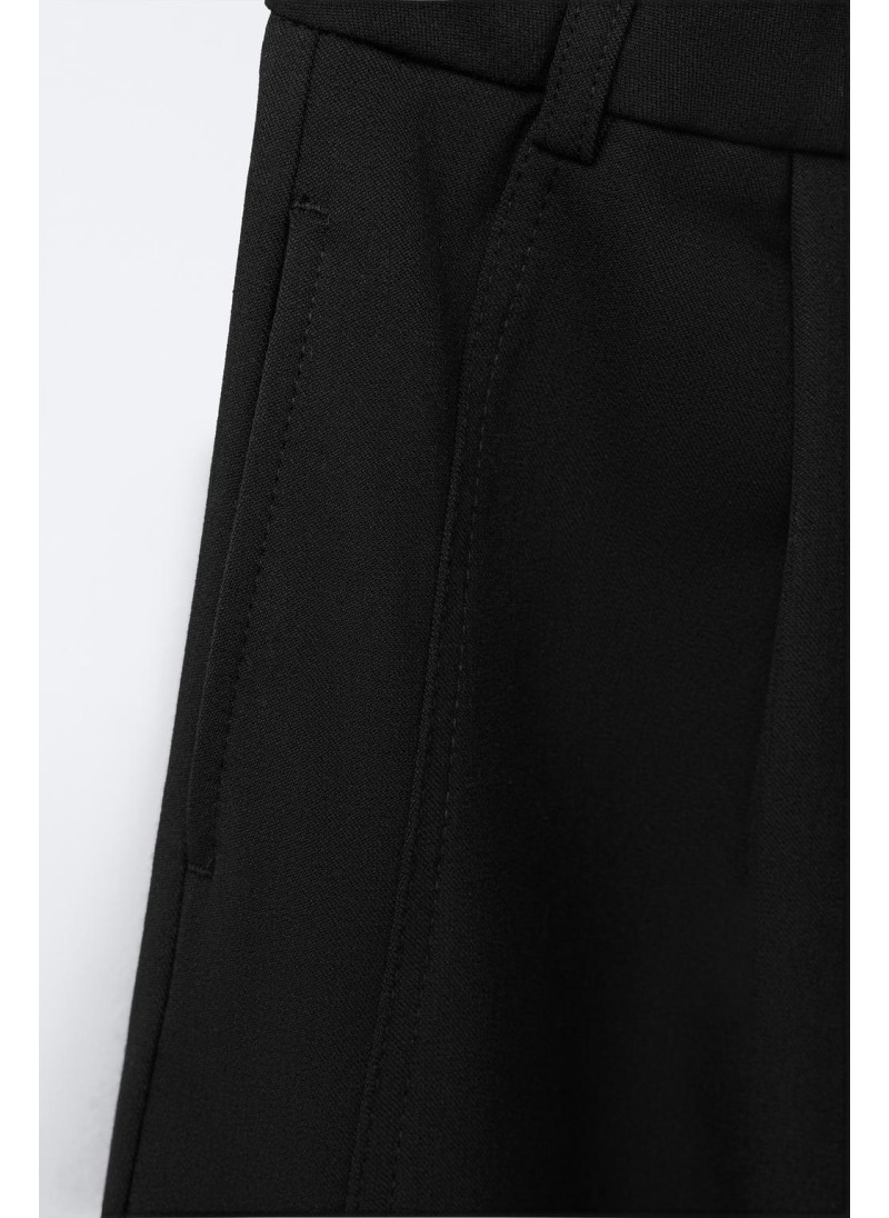 Брюки бочонкового покроя с застрочками Брюки бочонкового покроя с застрочками