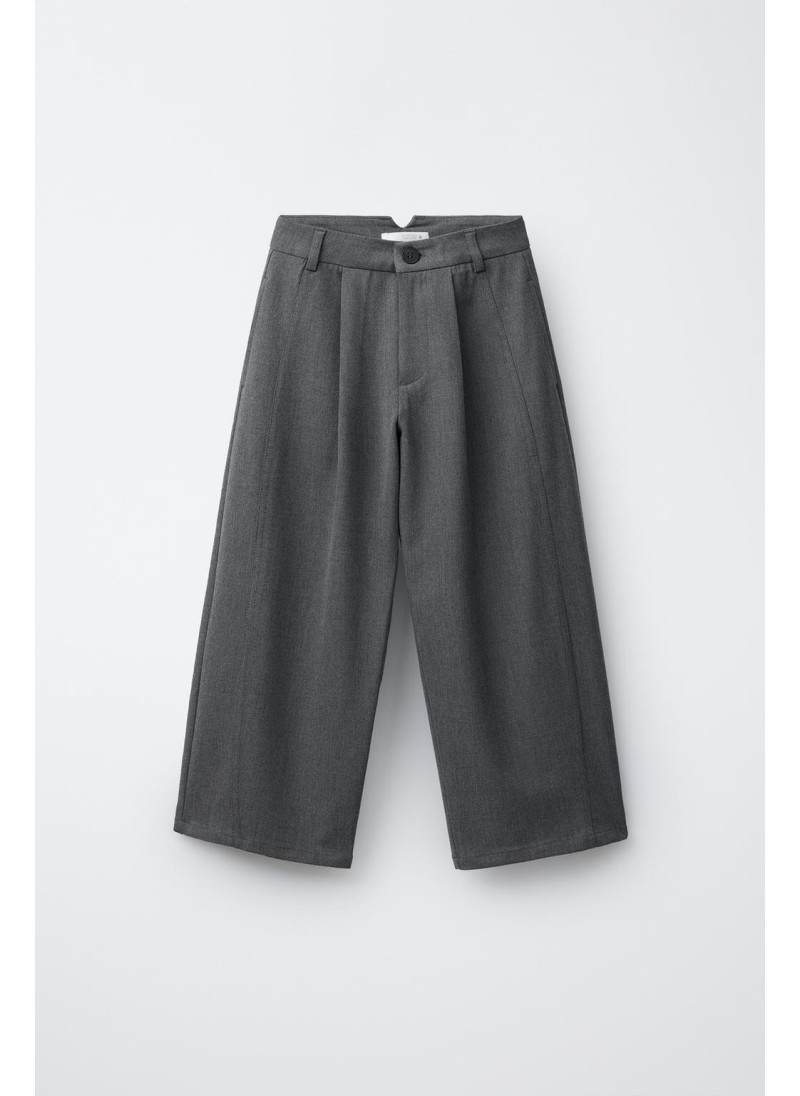 Брюки бочонкового покроя с ...