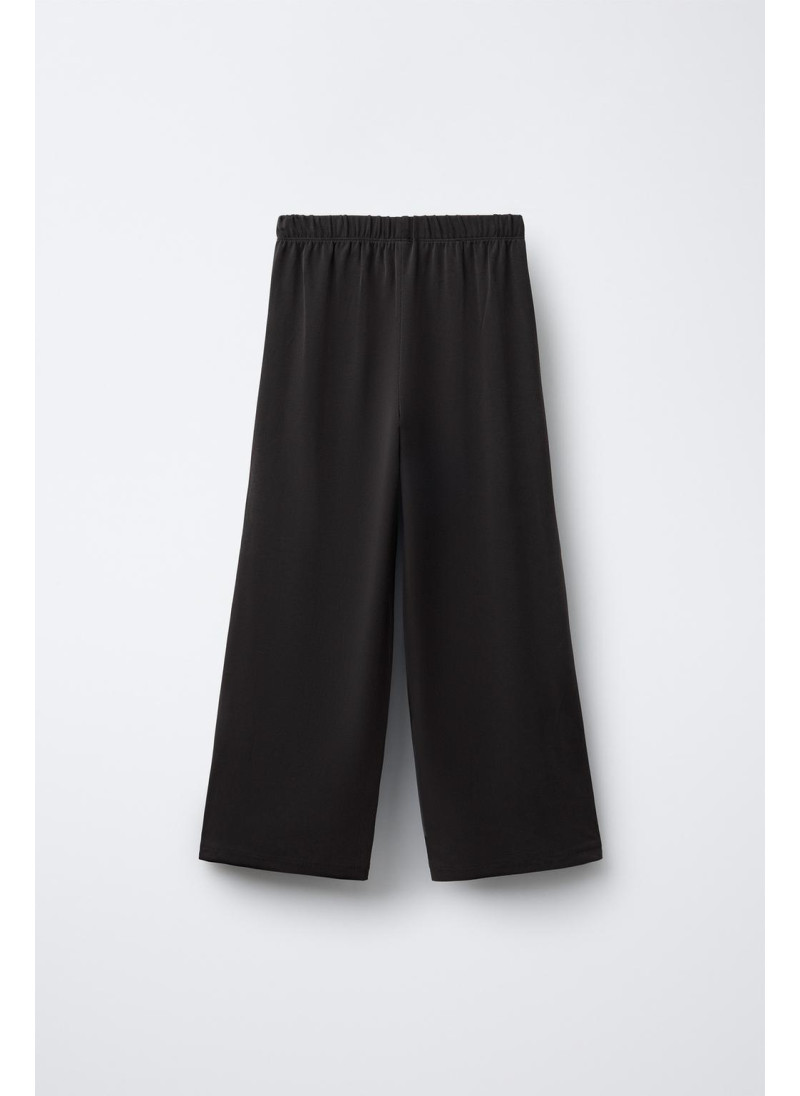 Широкие спортивные брюки Широкие спортивные брюки