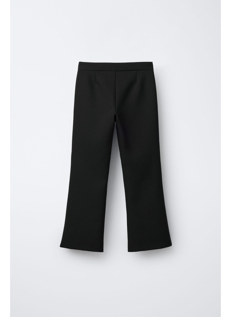 Брюки с цветочными деталями на замке Брюки с цветочными деталями на замке