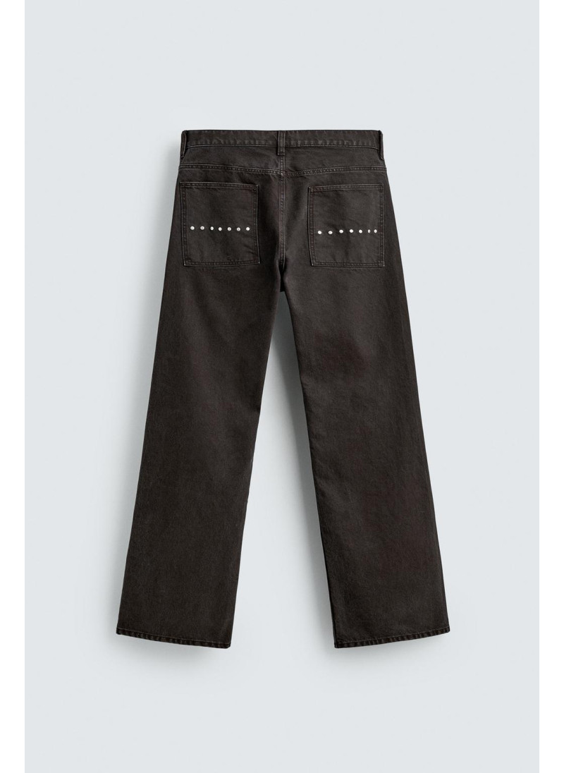 Джинсы с расклешенными штанинами и восковым покрытием Джинсы с расклешенными штанинами и восковым покрытием