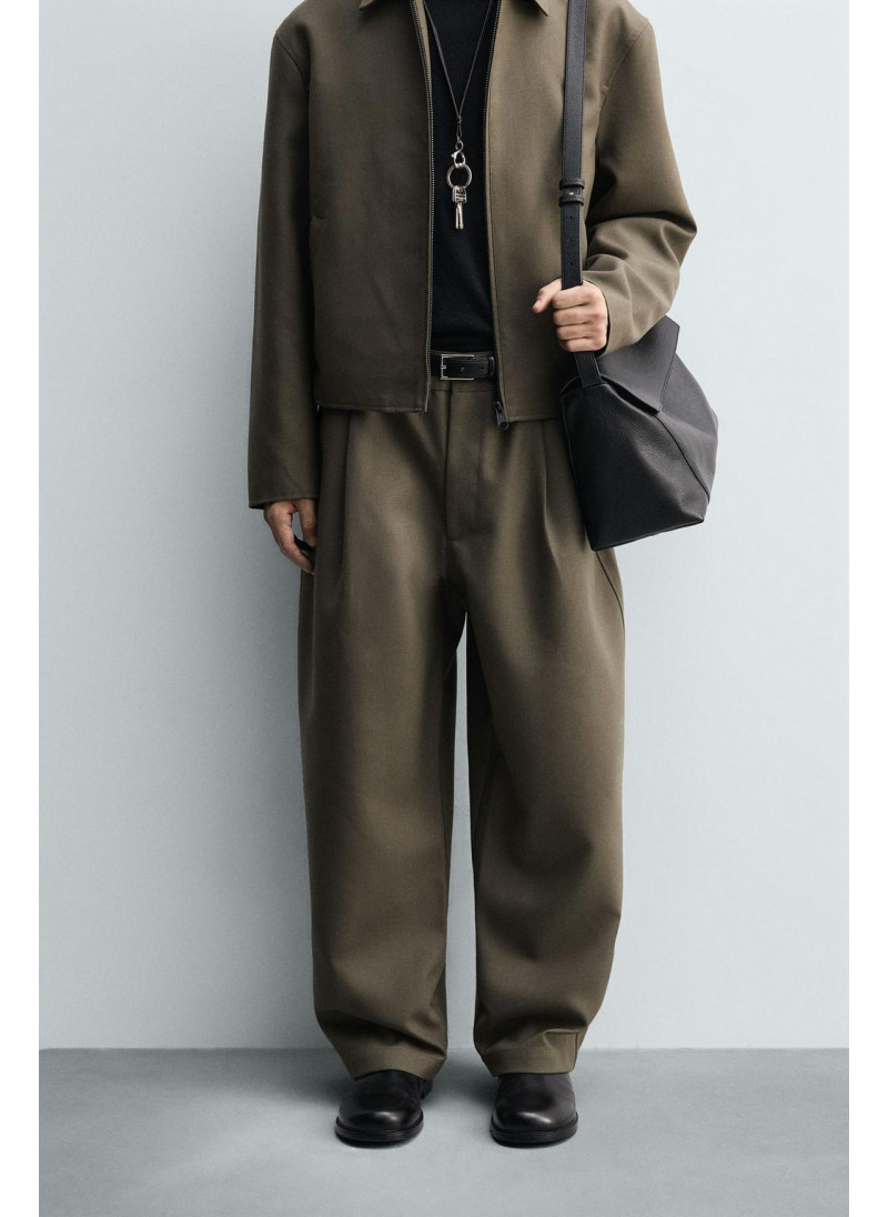 Брюки с завышенной талией и манжетами на резинке Брюки с завышенной талией и манжетами на резинке