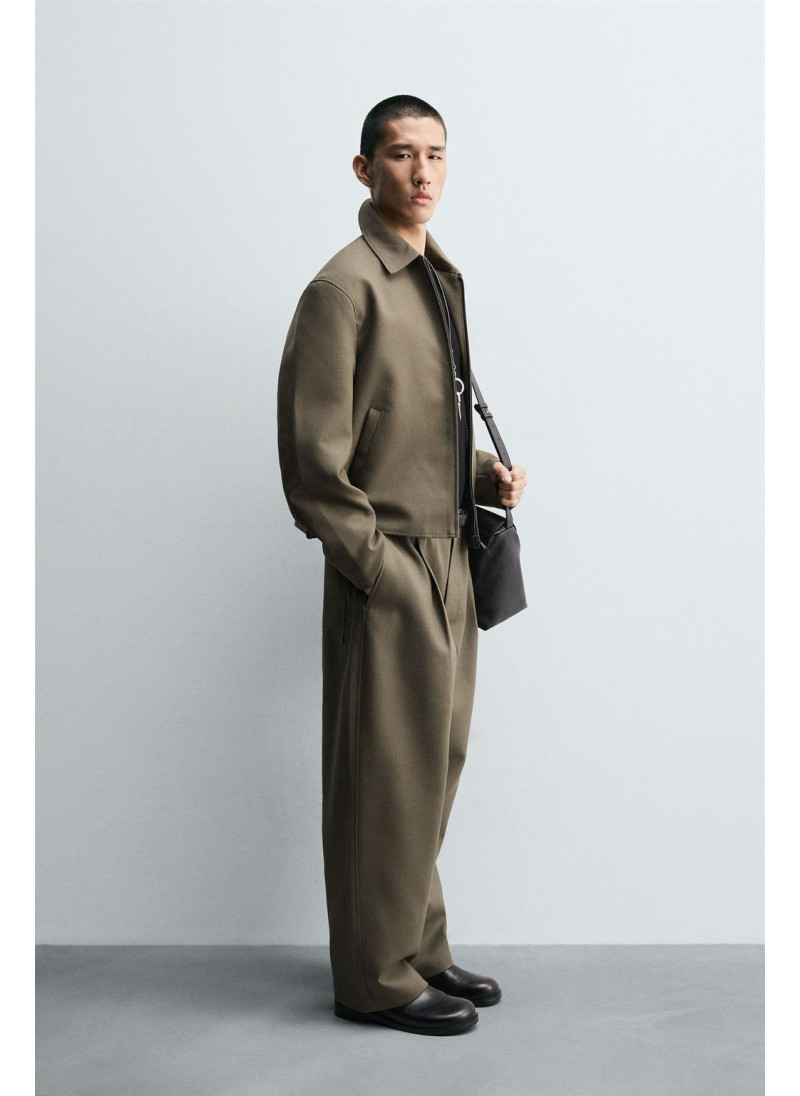 Брюки с завышенной талией и манжетами на резинке Брюки с завышенной талией и манжетами на резинке