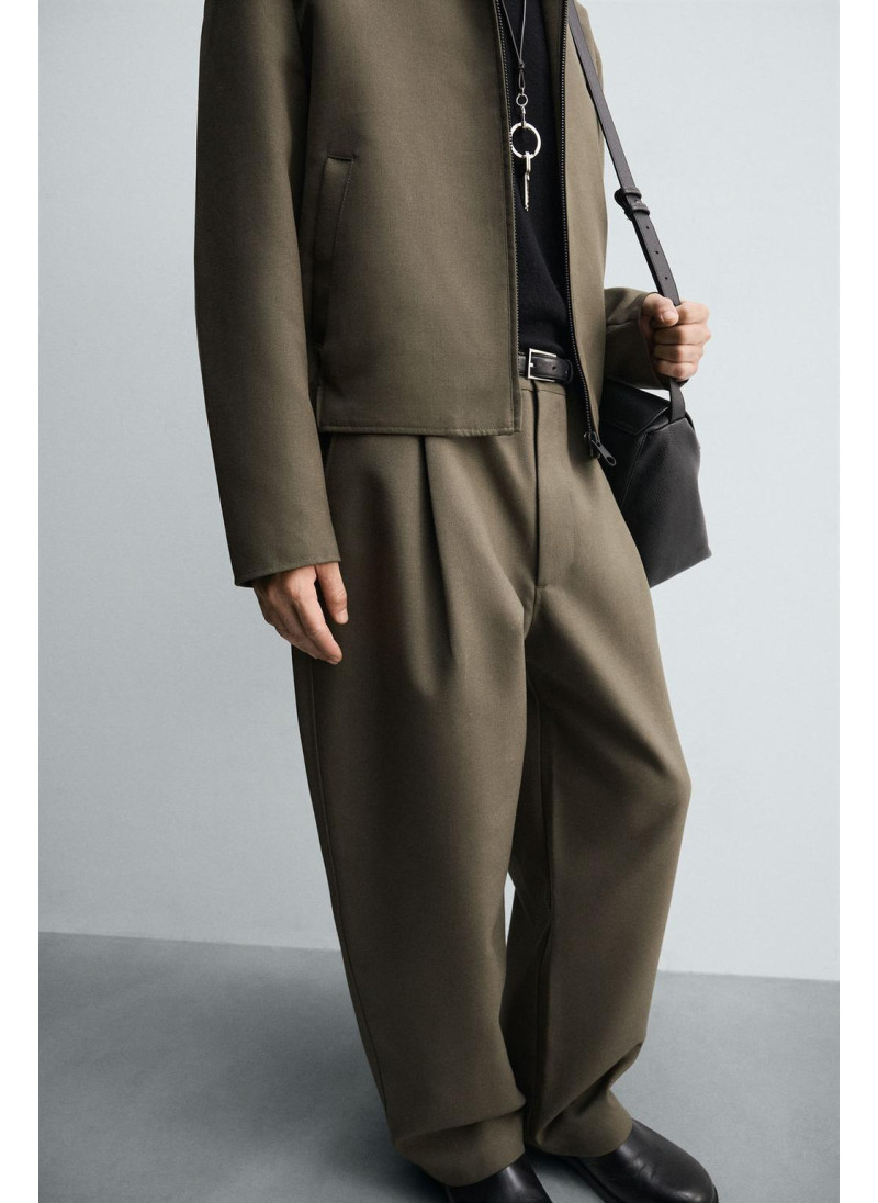 Брюки с завышенной талией и манжетами на резинке Брюки с завышенной талией и манжетами на резинке