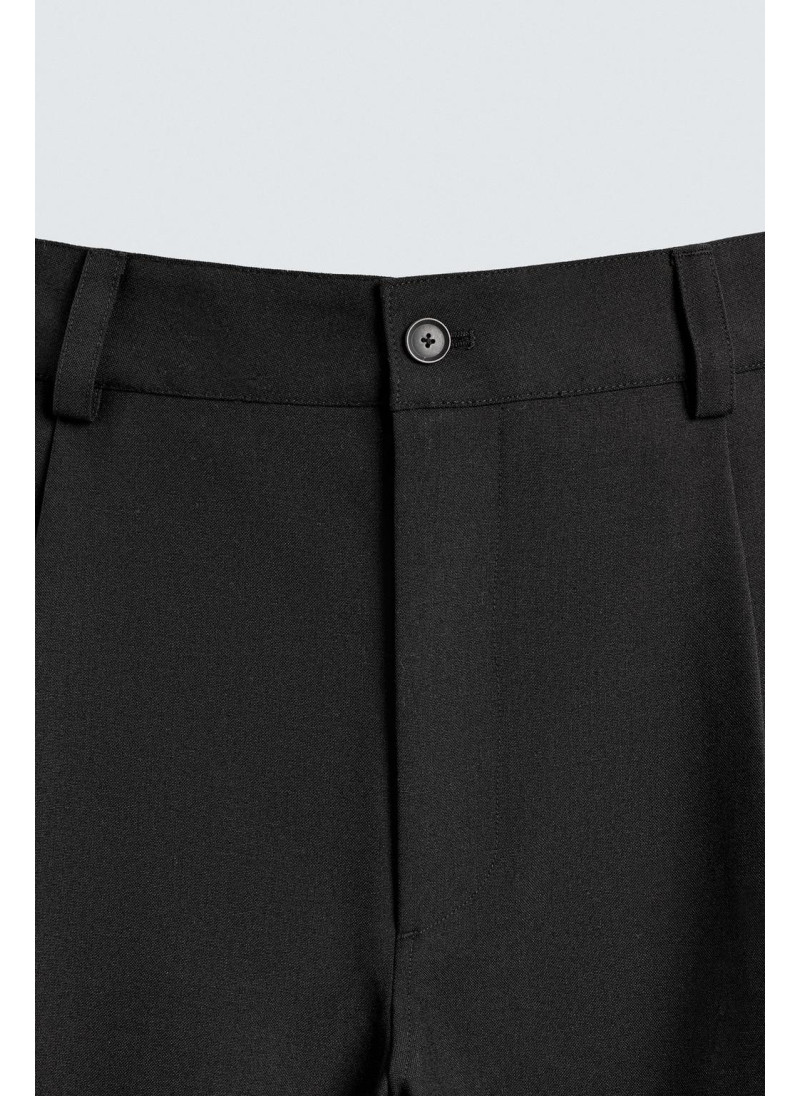 Брюки с завышенной талией и манжетами на резинке Брюки с завышенной талией и манжетами на резинке