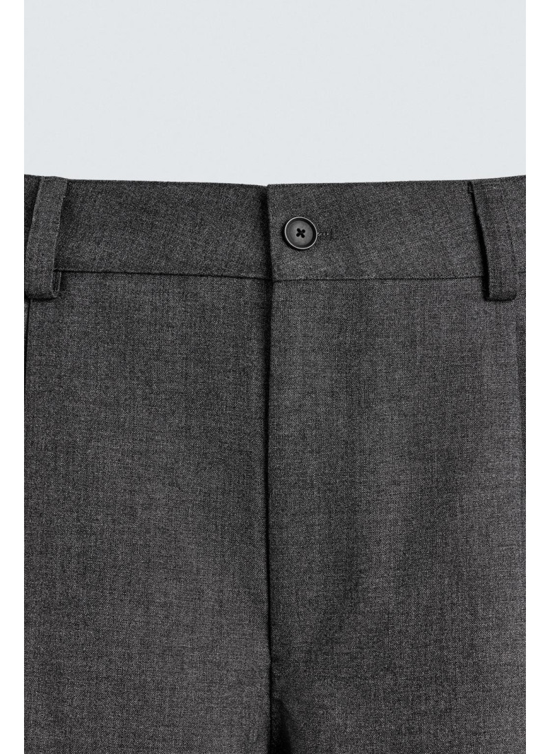 Брюки с завышенной талией и манжетами на резинке Брюки с завышенной талией и манжетами на резинке