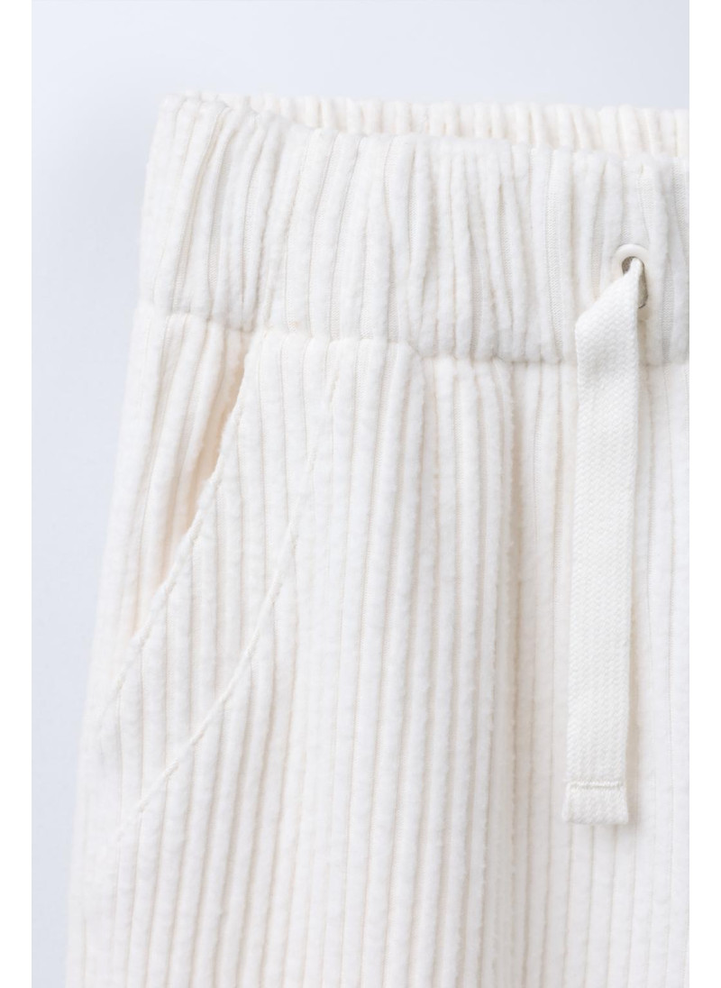 БРЮКИ В РУБЧИК ИЗ МЯГКОЙ ТКАНИ БРЮКИ В РУБЧИК ИЗ МЯГКОЙ ТКАНИ