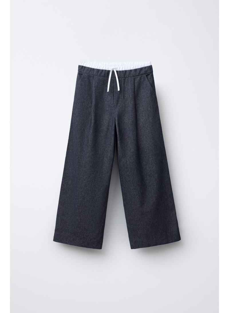 Теплые брюки с двойной пояс...