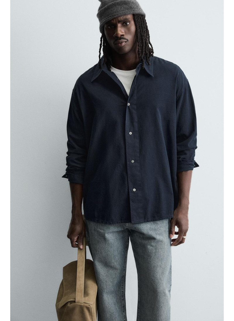 Рубашка в клетку свободного кроя Рубашка в клетку свободного кроя