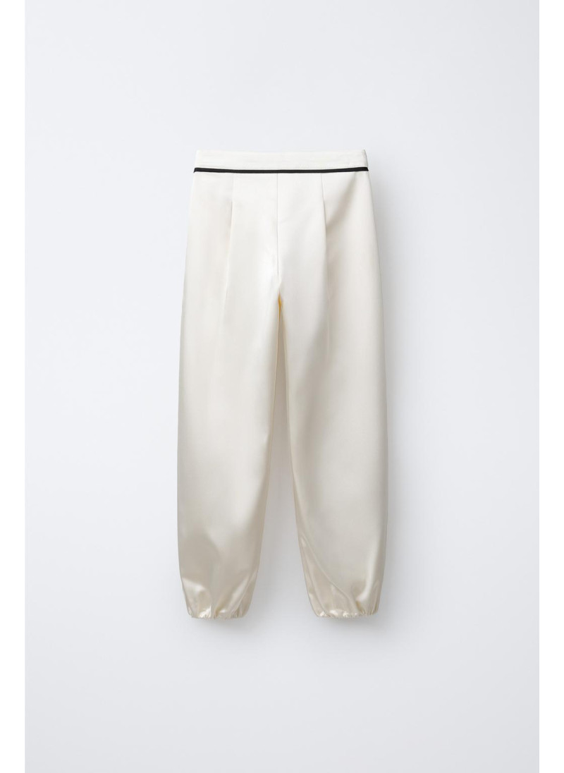 Брюки sarouel с цветочным аппликацией Брюки sarouel с цветочным аппликацией