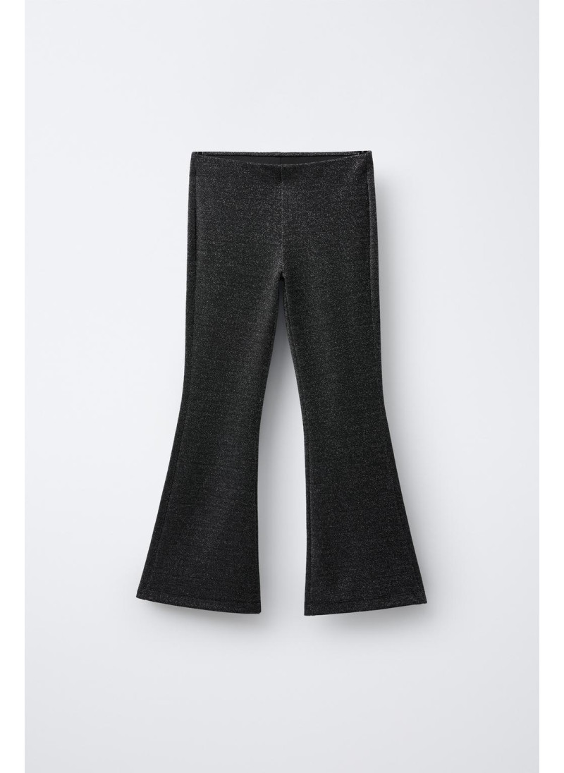 Блестящие леггинсы с расклешенным низом Блестящие леггинсы с расклешенным низом