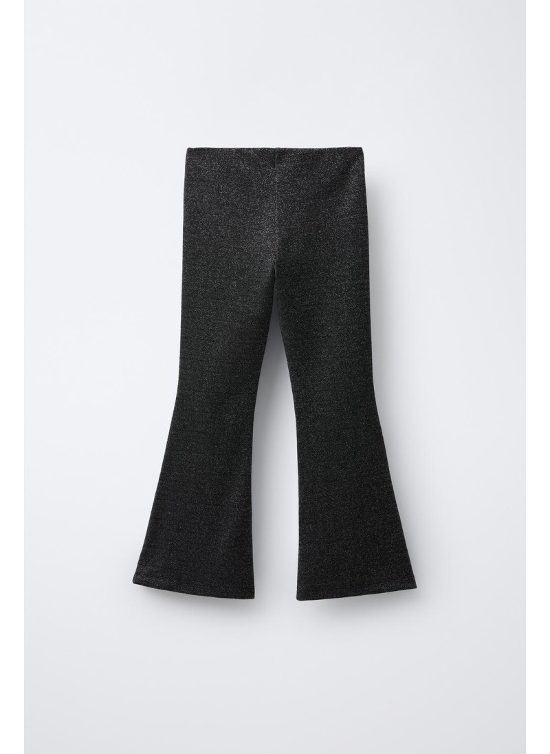 Блестящие леггинсы с расклешенным низом Блестящие леггинсы с расклешенным низом