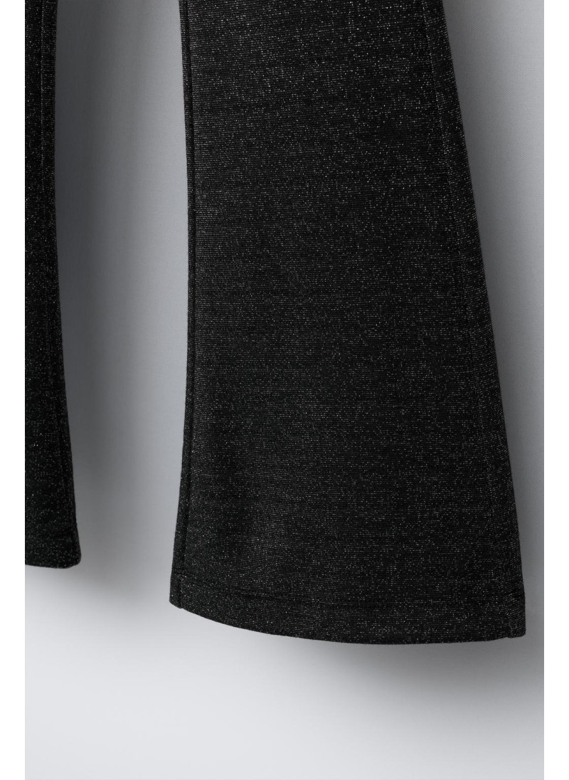 Блестящие леггинсы с расклешенным низом Блестящие леггинсы с расклешенным низом