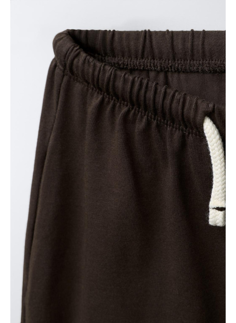 ШИРОКИЕ БРЮКИ ИЗ ПЛОТНОЙ ТКАНИ С ВЫШИВКОЙ ШИРОКИЕ БРЮКИ ИЗ ПЛОТНОЙ ТКАНИ С ВЫШИВКОЙ